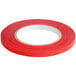 A roll of Shurtape red poly bag sealer tape.
