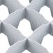 A white plastic grid for stemware with 36 compartments.