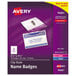 A package of Avery white name badge clip holders with a purple and white label.