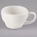 A Libbey ivory porcelain coffee cup with a handle.