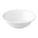 A Libbey Aluma White Porcelain grapefruit bowl with a curved edge on a white background.