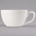 A Libbey ivory porcelain coffee cup with a handle.