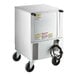 A silver rectangular Beverage-Air undercounter refrigerator with glass door and wheels.