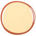 A Libbey Terracotta plate with a white surface and brown rim.