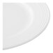 A close-up of a white Reserve by Libbey Aluma White Porcelain Plate with a thin stripe on it.