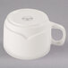 A Libbey ivory porcelain mug with a handle.