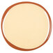 A white plate with a brown rim.