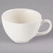 A Libbey ivory porcelain coffee cup with a handle.