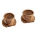 Two brass Vulcan bushings.
