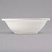 A Libbey Ivory porcelain grapefruit bowl on a white surface