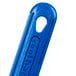 A blue Vollrath Cool Handle II silicone pan handle sleeve with a hole in the middle.