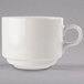 A white porcelain Libbey tea cup with a handle.
