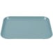 A blue rectangular Cambro Camlite tray with a small handle.