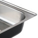 A stainless steel sink with a silver rim.