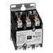 A close-up of a black and silver Vulcan 3-pole contactor.