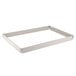 A white fiberglass rectangular pan extender with metal corners.