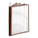 A brown leather Thunder Group menu cover with clear plastic pockets.