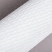 A close-up of a white Manitowoc Primary Tri-L Water Filter roll.