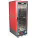 A red and silver Metro C5 heated holding and proofing cabinet with a clear door.