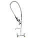 A chrome Equip by T&S wall mounted pre-rinse faucet with hose and spout.