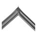 A Metro RPC06-873A holding cabinet door seal with metal strips.
