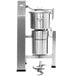 A large stainless steel Robot Coupe vertical cutter mixer with a bowl and a whisk attachment.