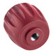 A red plastic knob with a nut.