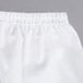 A close up of a white cloth with ruffles.