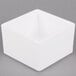 A white square Cal-Mil melamine box.