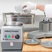 A person using a Robot Coupe 1/32" Slicing Disc to prepare food.