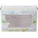 A white window bakery box with a drawing of a lamb.