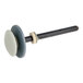 A close-up of a white and grey Kason release lever.