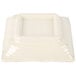 A white square Thunder Group sauce dish with a square center.