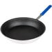 A Vollrath Wear-Ever aluminum non-stick fry pan with a blue Cool Handle.