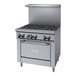 A large stainless steel Garland gas range with six burners.