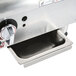 A stainless steel APW Wyott CharRock lava rock charbroiler on a countertop.