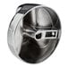 A close up of a Vulcan metal knob with a hole in the center.