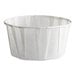A white paper 5.5 oz. souffle or portion cup.