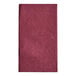A red napkin on a white background.