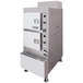A Cleveland 6 pan convection floor steamer with drawers and knobs.