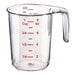 A clear plastic measuring cup with a smaller measuring cup on top with red measurements.