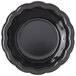 A black Carlisle ramekin with a scalloped edge.