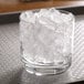 a glass with ice in it