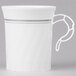 a white mug with a handle