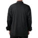 the back of a person wearing a black shirt