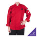 A person wearing a Mercer Culinary red chef coat with white sleeves.