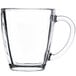 A clear glass Libbey square warm beverage mug with a handle.