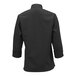 A black chef jacket with long cuffed sleeves.