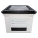 An Innovative Storage Designs clear plastic file tote with a black lid and label for contents.