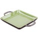 a green square plate with handles